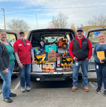 United Way Holiday Donation with a packed van.